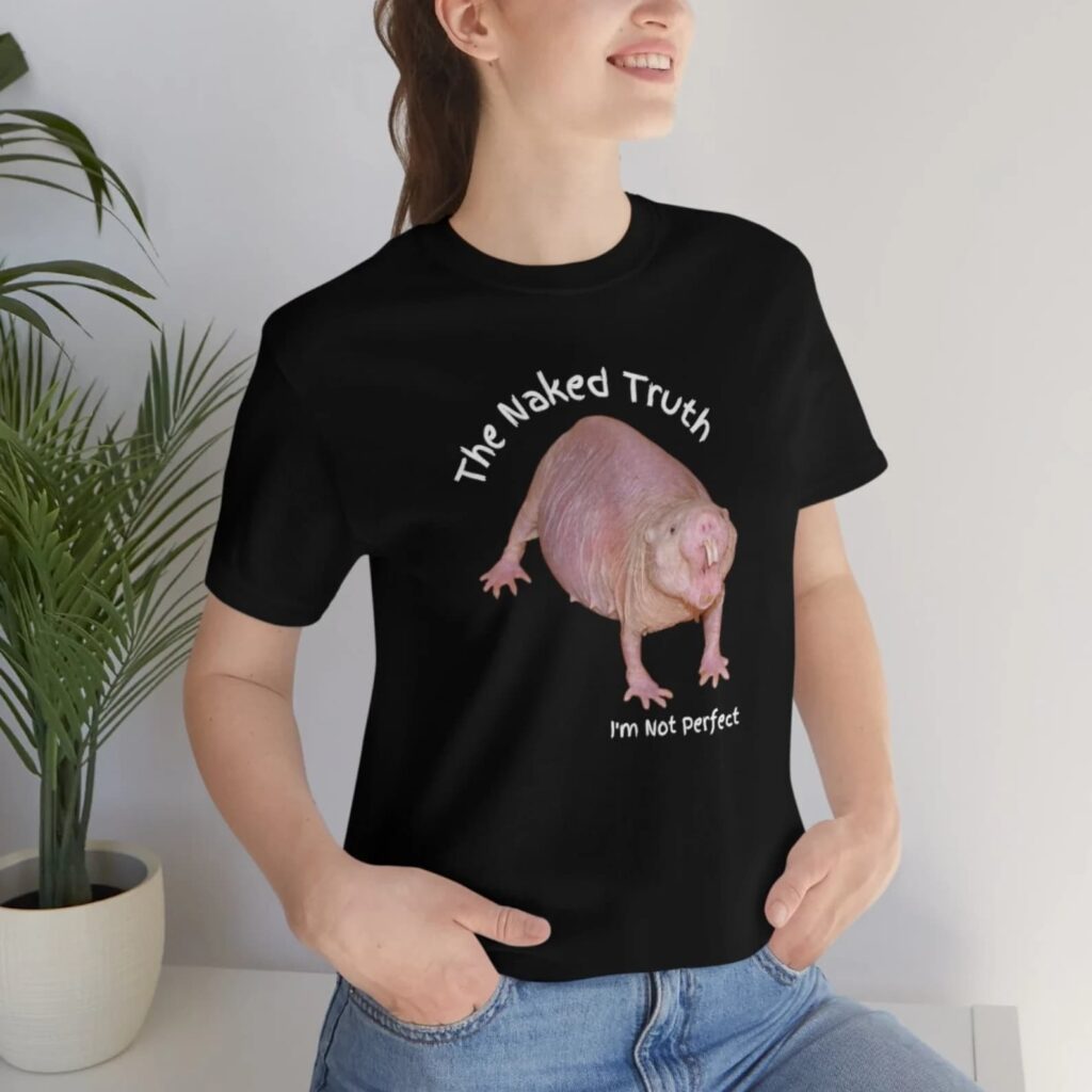 Woman wearing naked mole rat t-shirt with text: The Naked Truth - I'm Not Perfect.